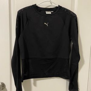 Very stylish Puma athletic sweater with fishnet detailing in size M
